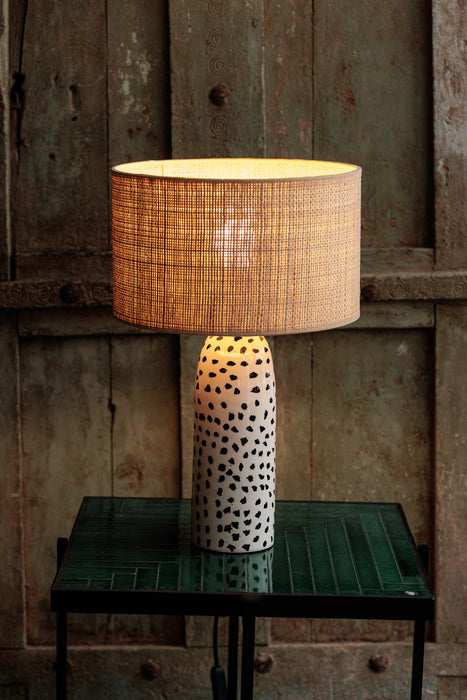 Lampe artisanale à pois noirs